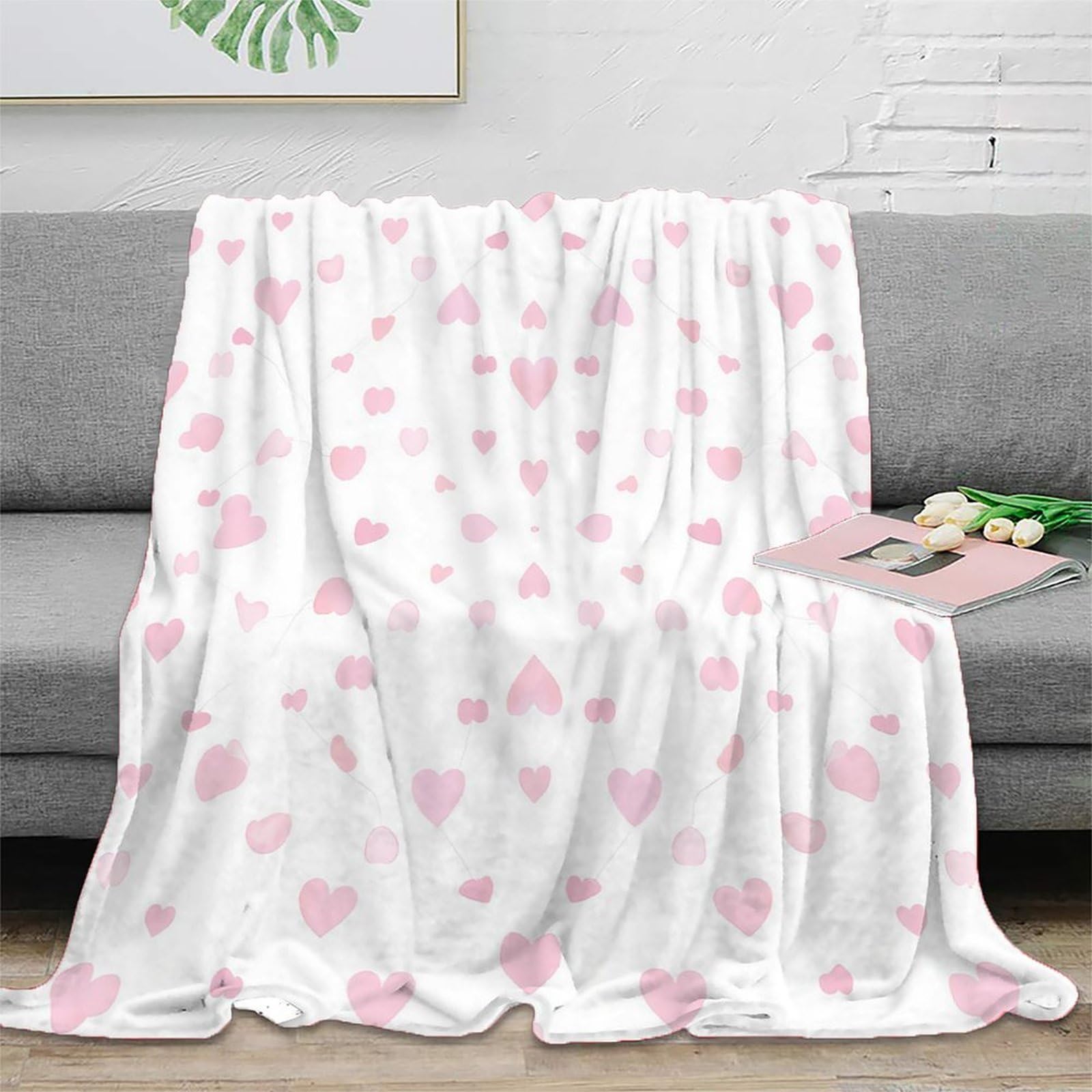 Couverture motif coeurs 3D pour des soirées cocooning et révisions d'étudiants