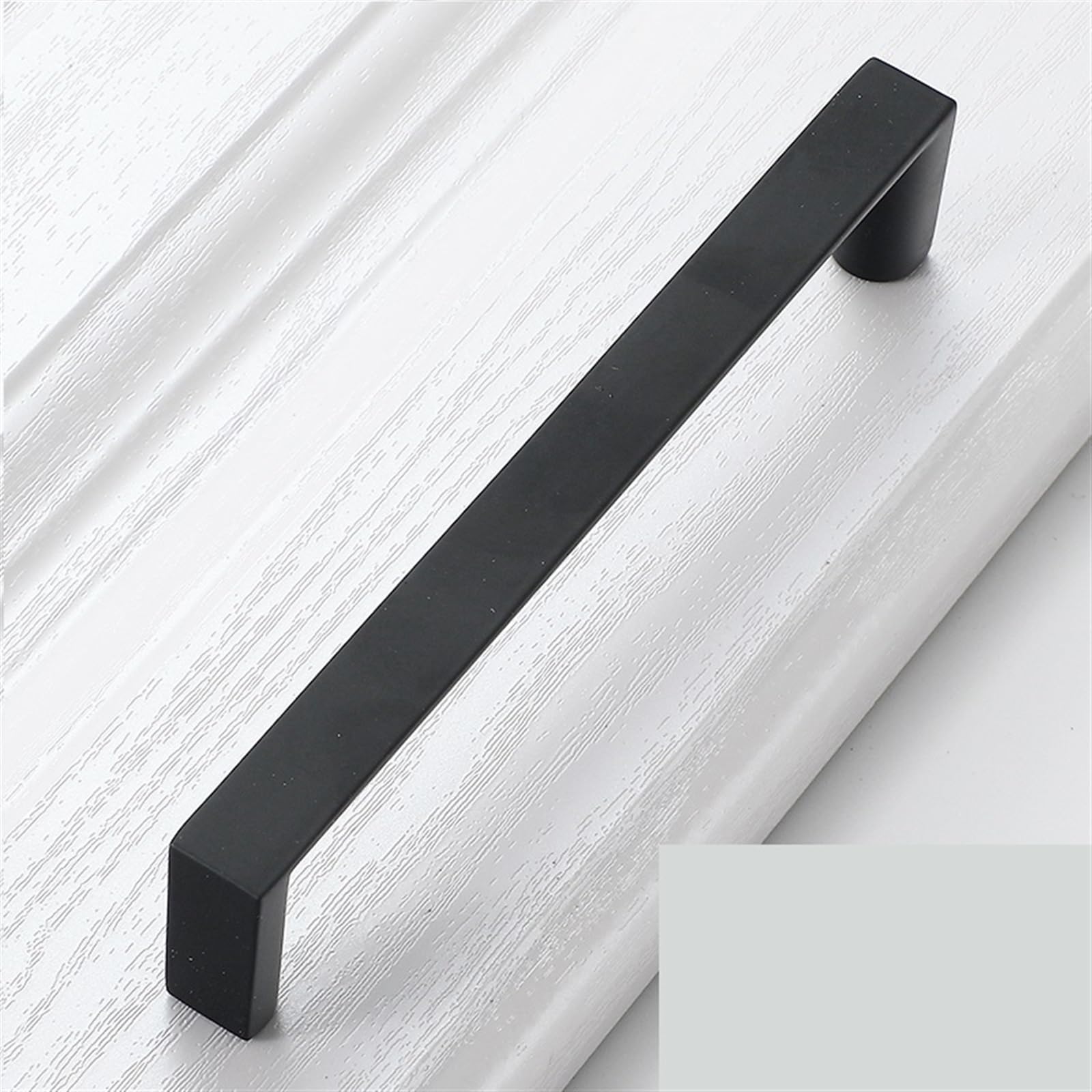 Tiroirs durs à ouvrir résolus par cette poignée d'armoire noire ergonomique en alu