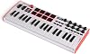 Akai Professional MPK Mini Plus - USB MIDI Keyboard Controller with 37 Mini Keys, 8 MPC Pads, Sequencer, MIDI/CV/Gate I/O, Production Software, Native Instruments Sound Package, White Limited Edition