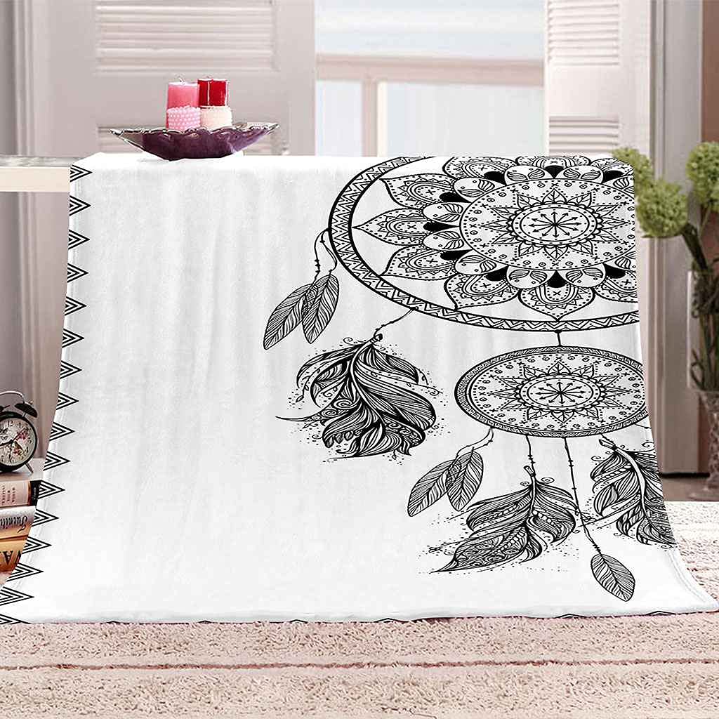 Couverture canapé capteur de rêves : votre plaid flanelle pour des soirées cocooning