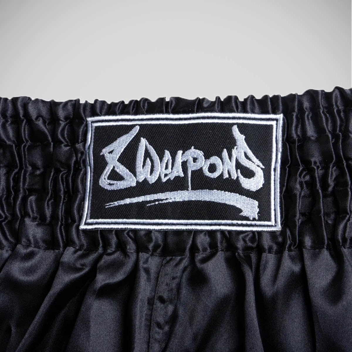 8 Weapons Pantalones cortos de Boxe Thaï Strike Negro