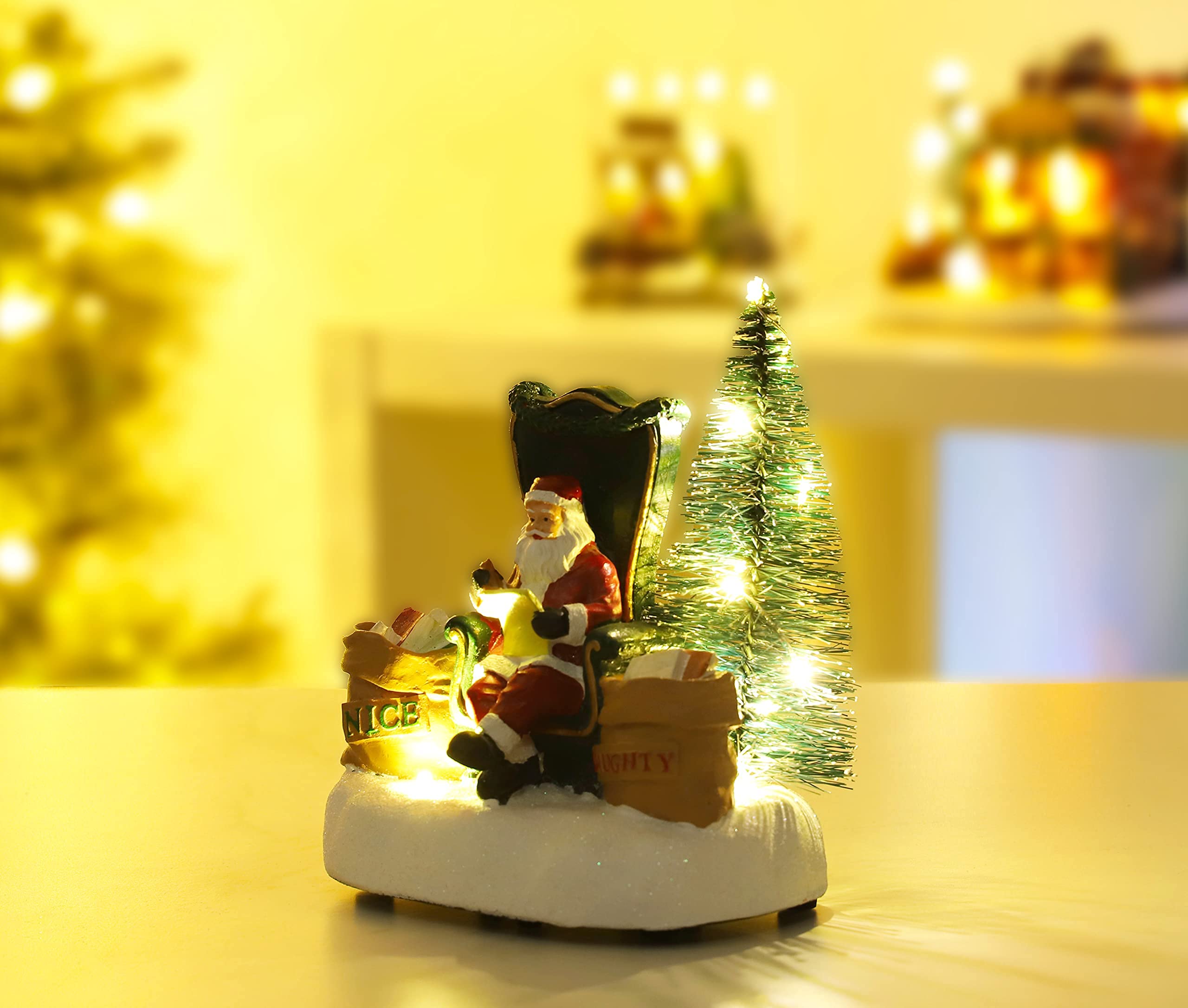 Christmas Concepts® 16cm (6.4") Père Noël lisant des Lettres Coquines et gentilles avec des lumières LED Blanches Chaudes - à Piles - Village de Noël