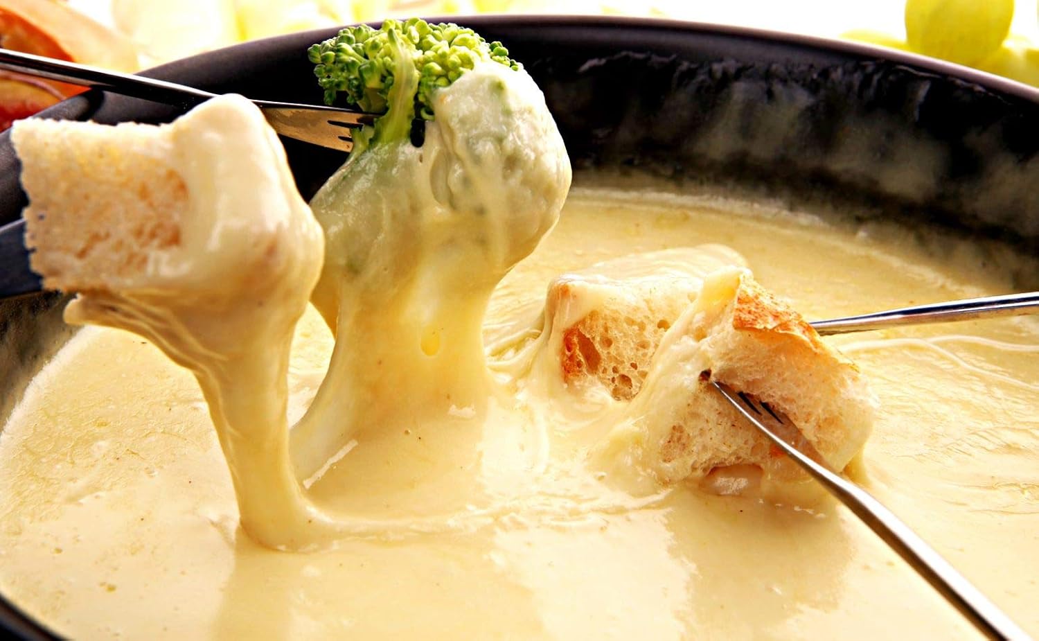 igourmet Gruyere Swisss Cheese AOP - 5 Pound Cut - This extra-special delicacy from the Gruyere district of Switzerland is well-known as the basic ingredient in fondue.