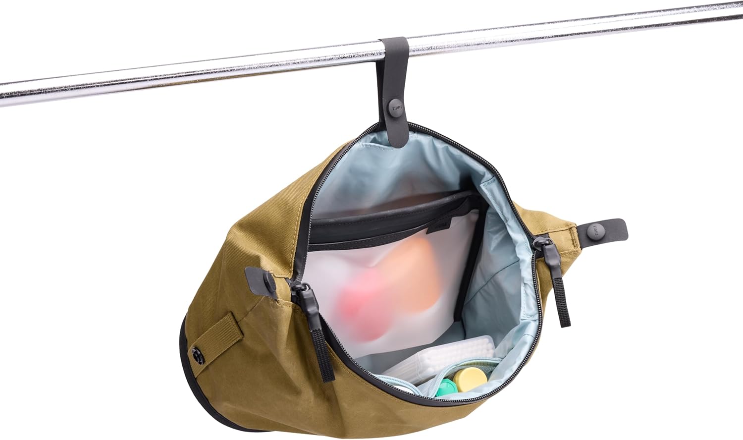 Thule Aion Toiletry Bag - Water-resistant bag for toiletries, makeup & shaving essentials - Removable liquids bag included - Easy to clean - Snap loop for easy hang - Waxed, PFC-free fabric