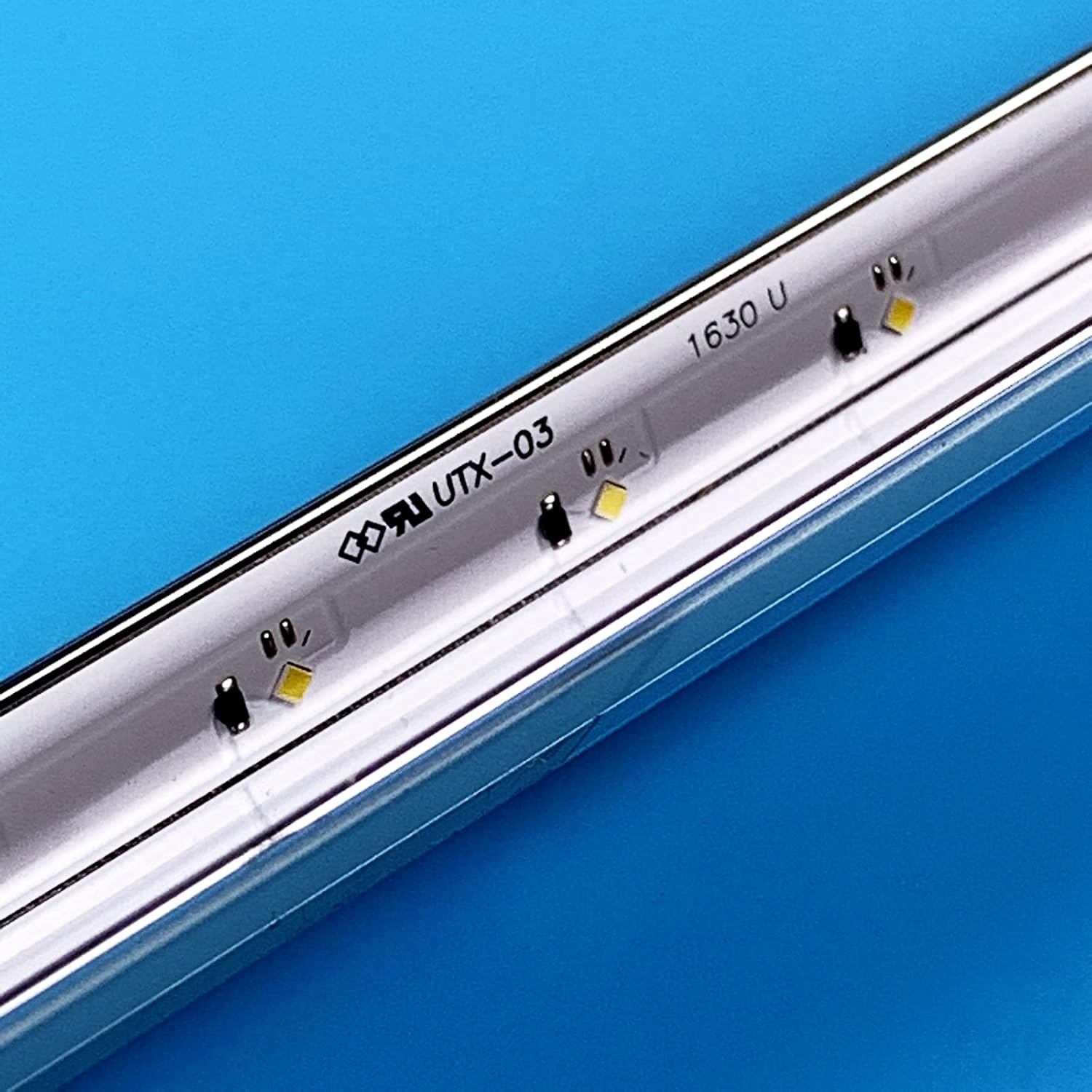 Detailed view of individual LEDs and circuit markings on the backlight strip.