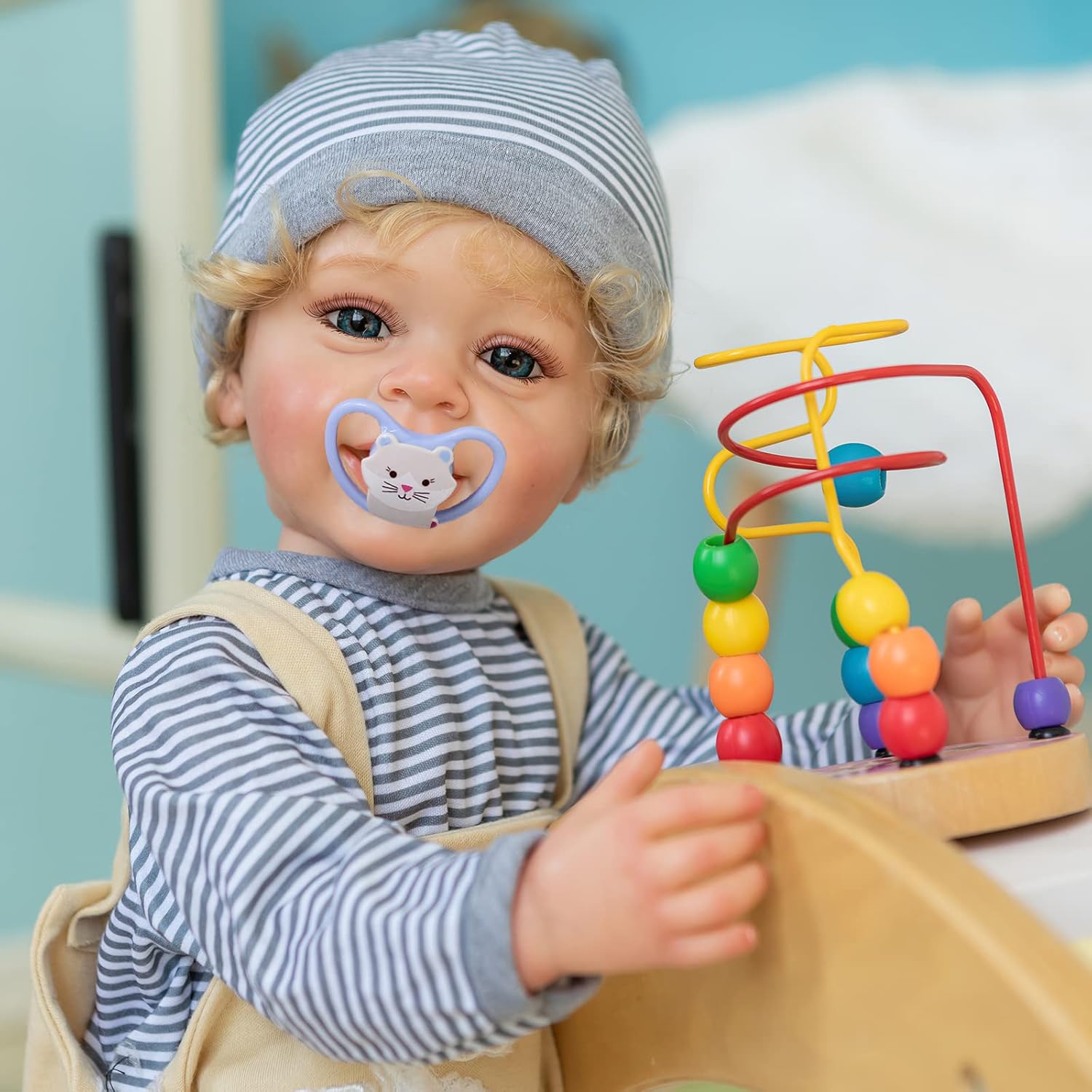 TERABITHIA 22 Inches Rooted Blond Curly Hair Lifelike Reborn Baby Doll Crafted in Vinyl Full Body Anatomically Correct Newborn Realistic Smiling Toddler Boy Dolls with Teeth Look Real