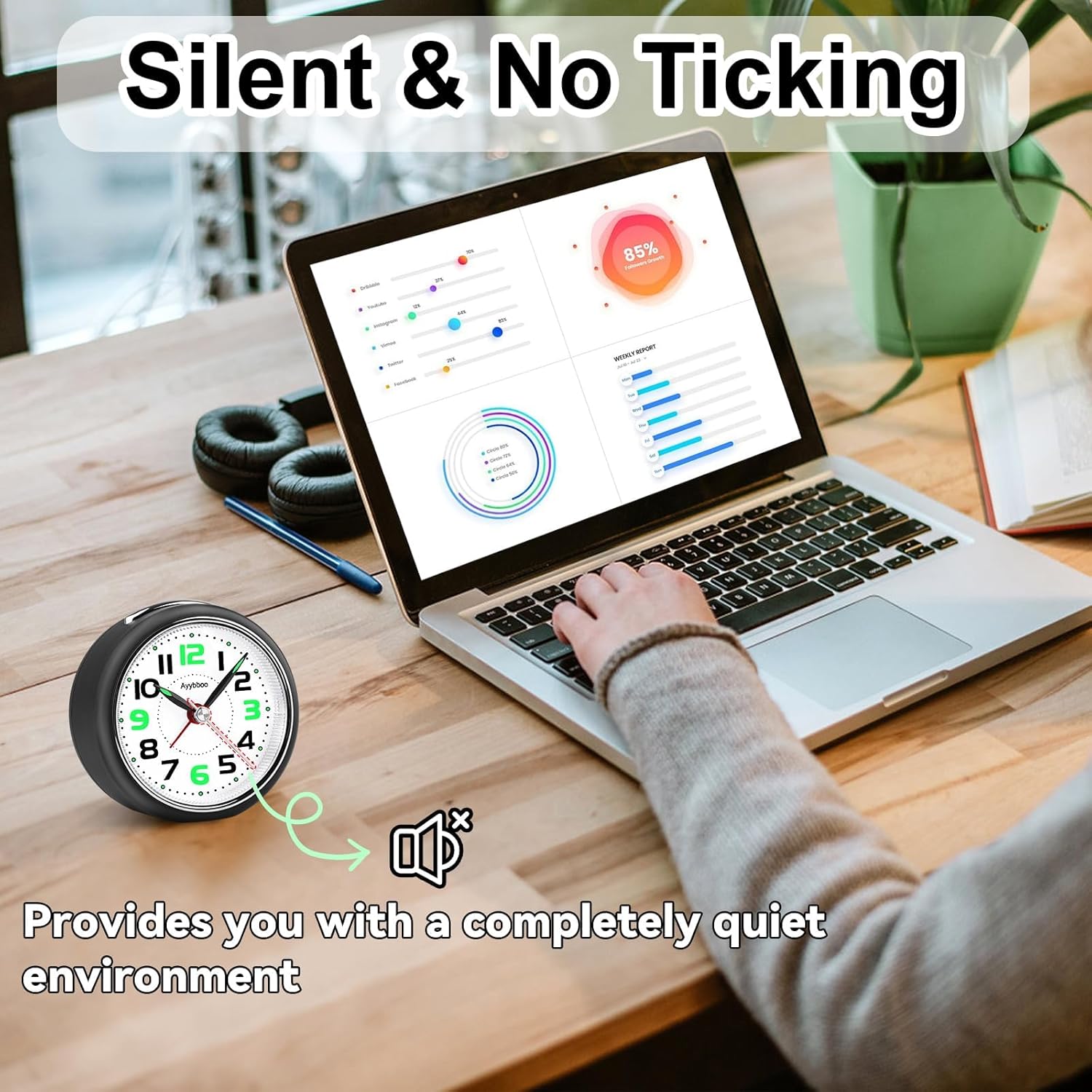 Ayybboo alarm clock with night light activated on a bedside table