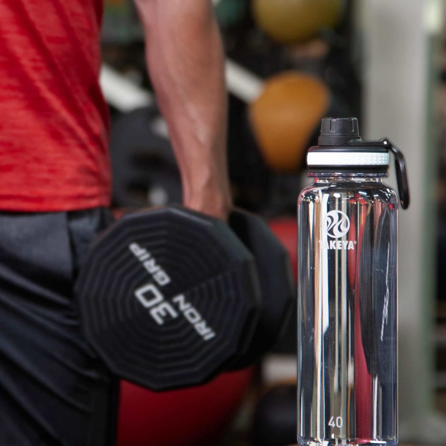 Takeya Tritan Water Bottle with Spout Lid - Durable Dishwasher-Safe Water Bottle - Simple, Modern Bottle - Reusable Water Bottle with Leak-Proof Lid - 40 oz, Clear - Image 5