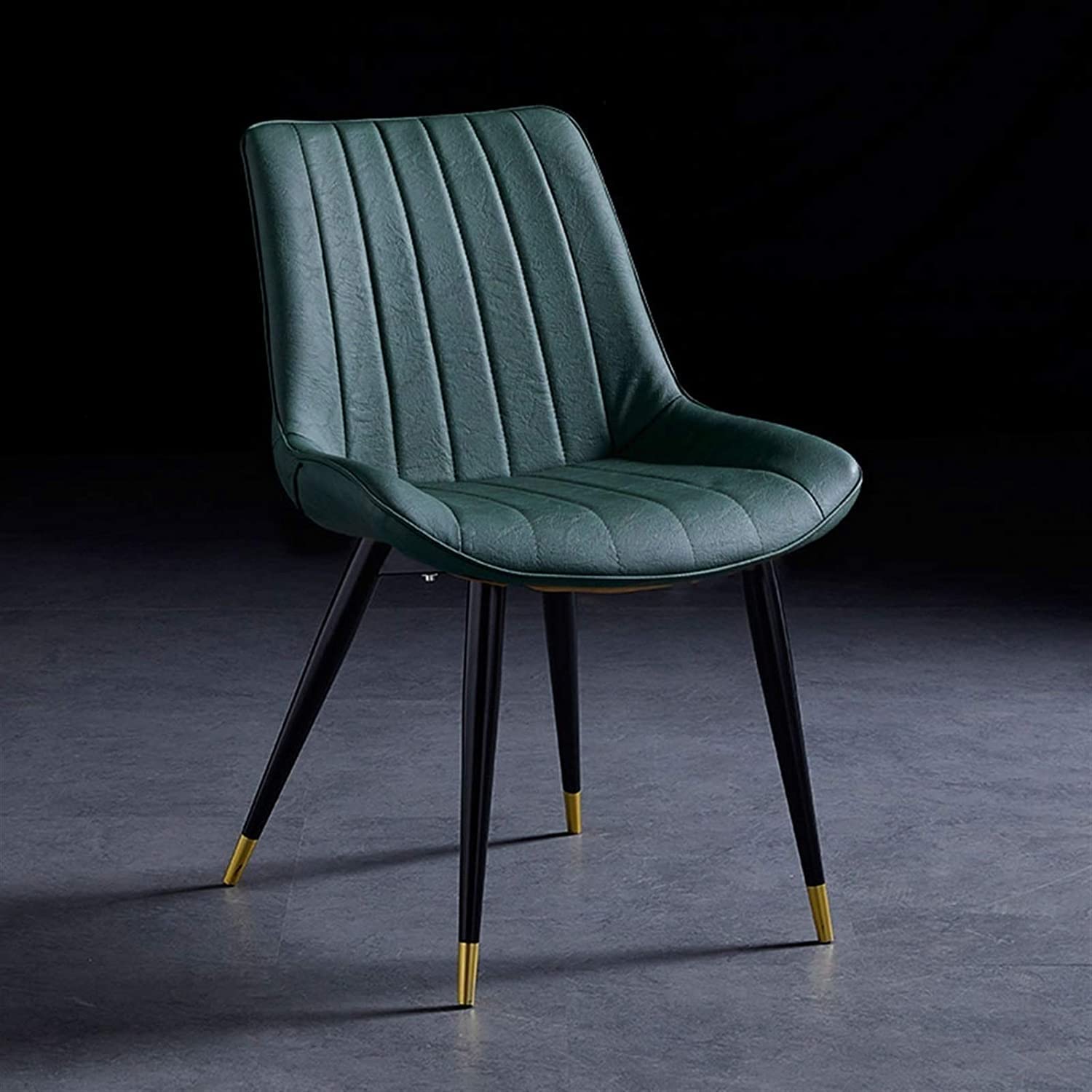 Chaise de salle à manger moderne verte avec siège en cuir synthétique et dossier ergonomique, pieds en métal noir robuste, assemblage facile, assise confortable pour salle à manger