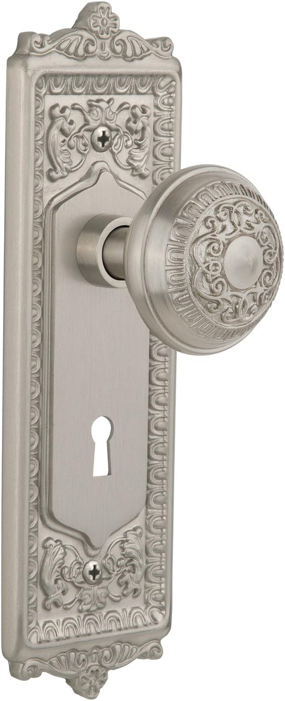 Nostalgic Warehouse Egg & Dart Plate with Keyhole Privacy Egg & Dart Door Knob in Timeless Bronze
