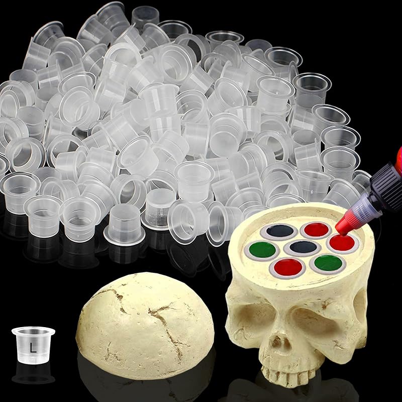 Rayyl Suporte para copos de tinta de tatuagem com 100 copos de 15 mm e suporte em formato de caveira, 7 encaixes
