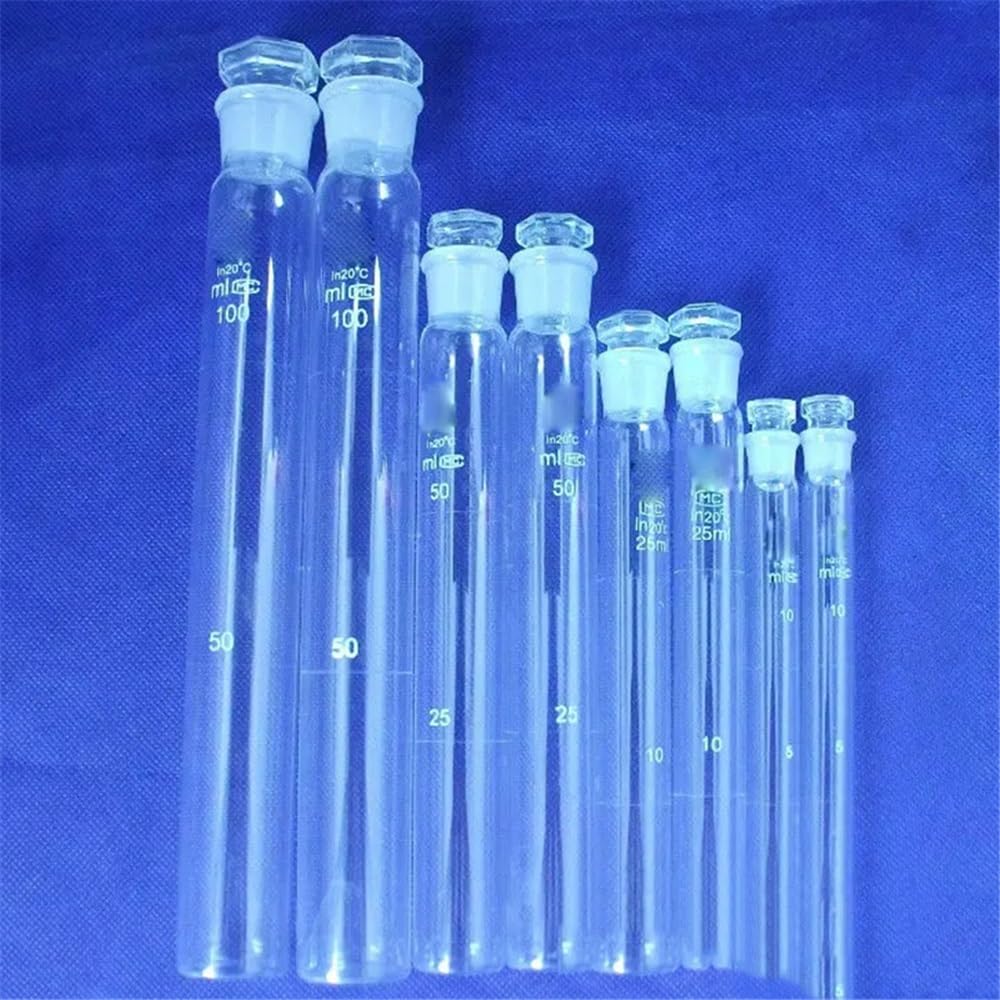 Cristalería de Laboratorio Lote de 12 cubetas de vidrio de 25 ml graduadas con tapón y fondo plano.