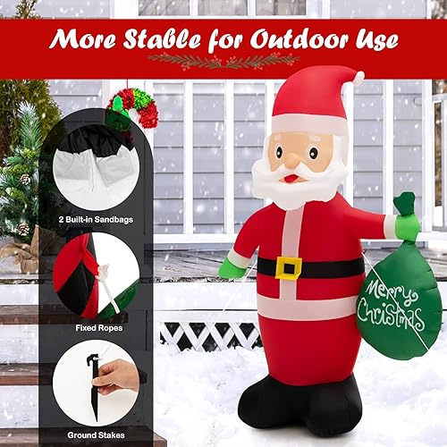 Miniatura 6 de Tangkula Santa Claus inflable de 5 pies con bolsa de regalo, Papá Noel de Navidad autoinflable con luces LED, bolsas de arena integradas, estacas,