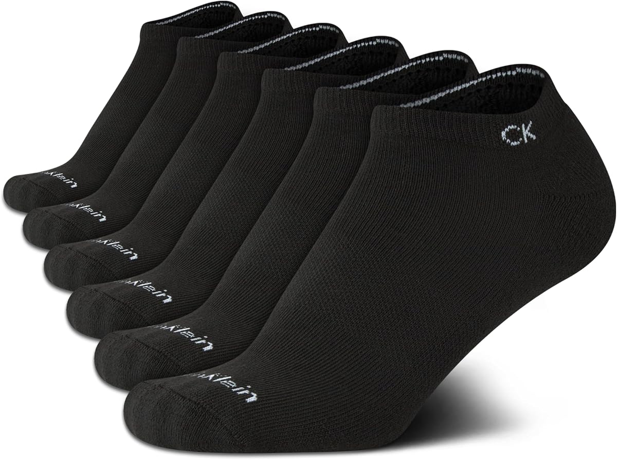 Calcetines deportivos Calvin Klein No Show Performance para niño (paquete de 6) | Tejido elástico cómodo, soporte para el arco y lengüeta suave en el talón, ajuste de corte bajo y transpirable que se mantiene en su sitio para la escuela y los deportes.