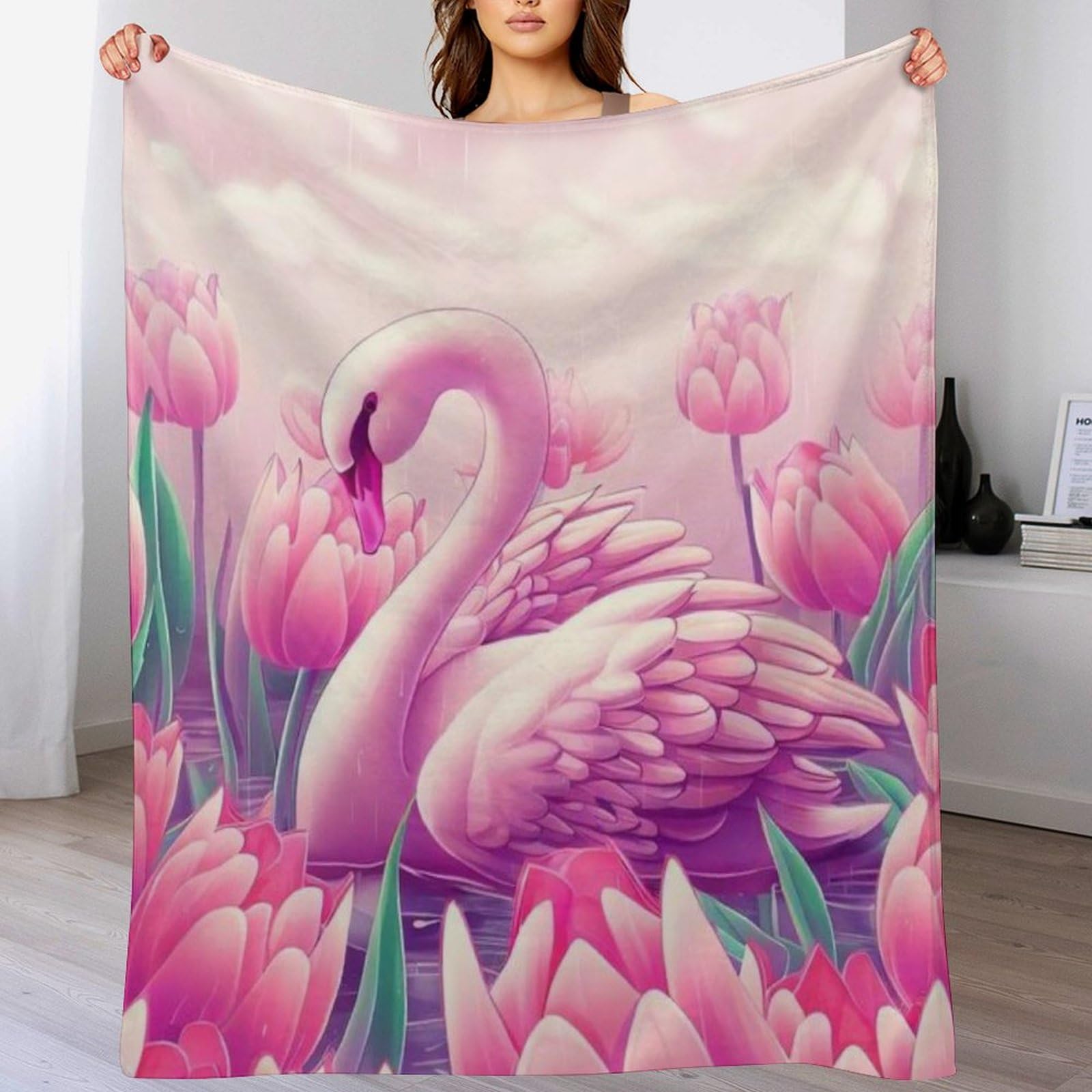 Plaid douillet cygne pour des soirées cocooning chaleureuses sur le canapé
