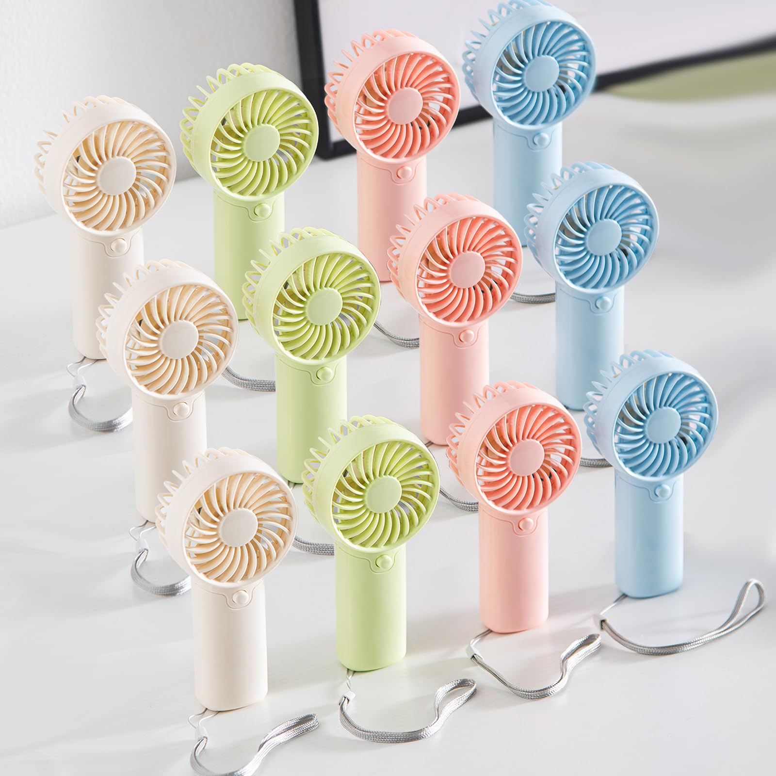 Lot de 12 mini ventilateurs portables – Fonctionne avec piles AAA de 12,7 cm, léger à main avec 1 vitesse et cordon – Ventilateur personnel silencieux pour enfants, filles, femmes et hommes – Idéal