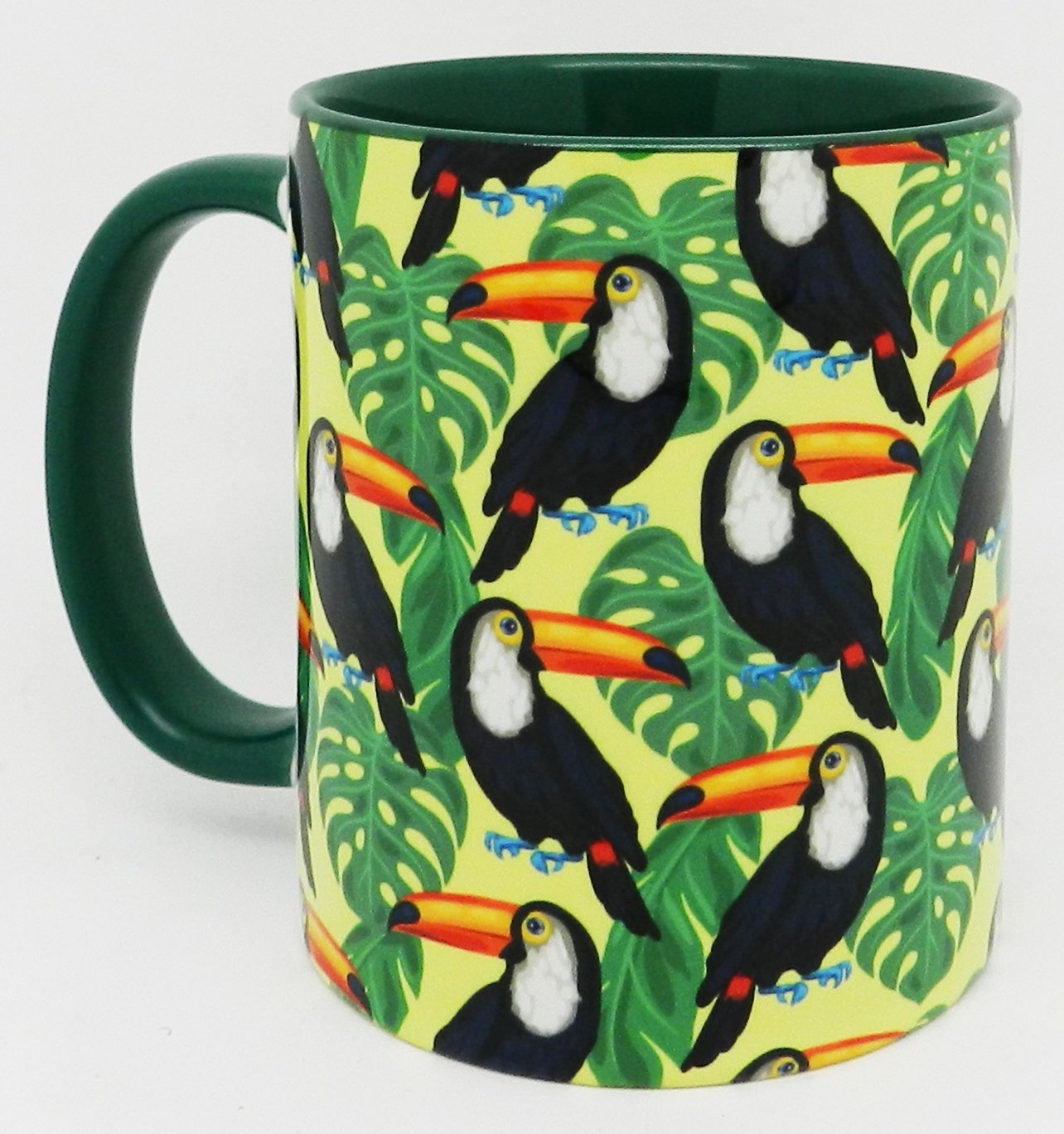 The Toucan Among The Leaves Mug with Glazed Green Handle and Inner by Half a Donkey