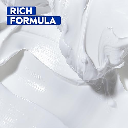 Miniatura 4 de NIVEA Crema hidratante para el cuerpo, la cara y las manos, fórmula alemana, rica crema hidratante corporal con provitamina B5, lata de 8.4 onzas