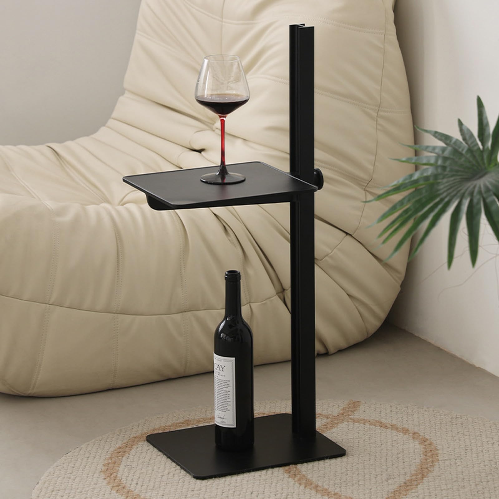 Mesa de centro regulable en altura con base en C y estructura de metal negra