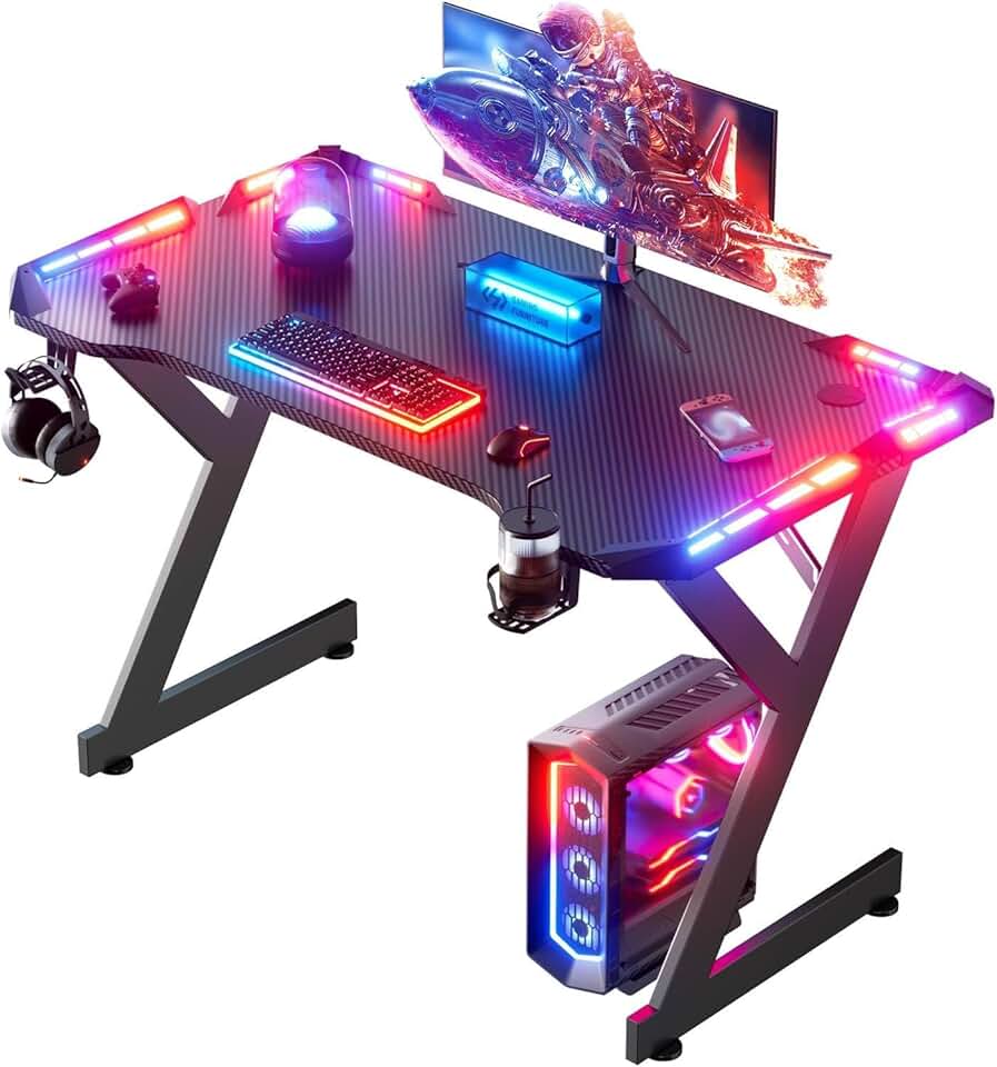 HLDIRECT 40 INCH Gaming Desk with LED Lights, Home Office Gamer Desk, Ergonomic Computer Table with Large Carbon Fiber Desktop, Office Workstation, Cup Holder &amp; Headphone Hook, Black The Forest Stewardship Council