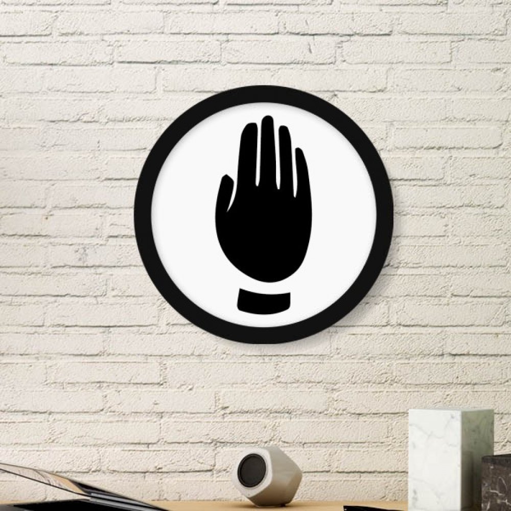 Peinture silhouette en cadre rond noir pour créer une ambiance zen dans votre salon