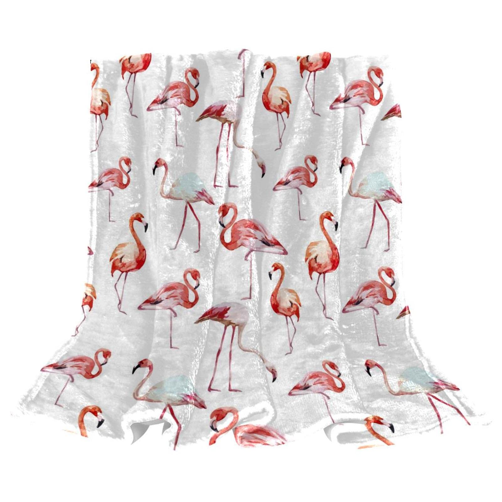 Couverture polaire légère flamants roses pour réchauffer vos soirées canapé