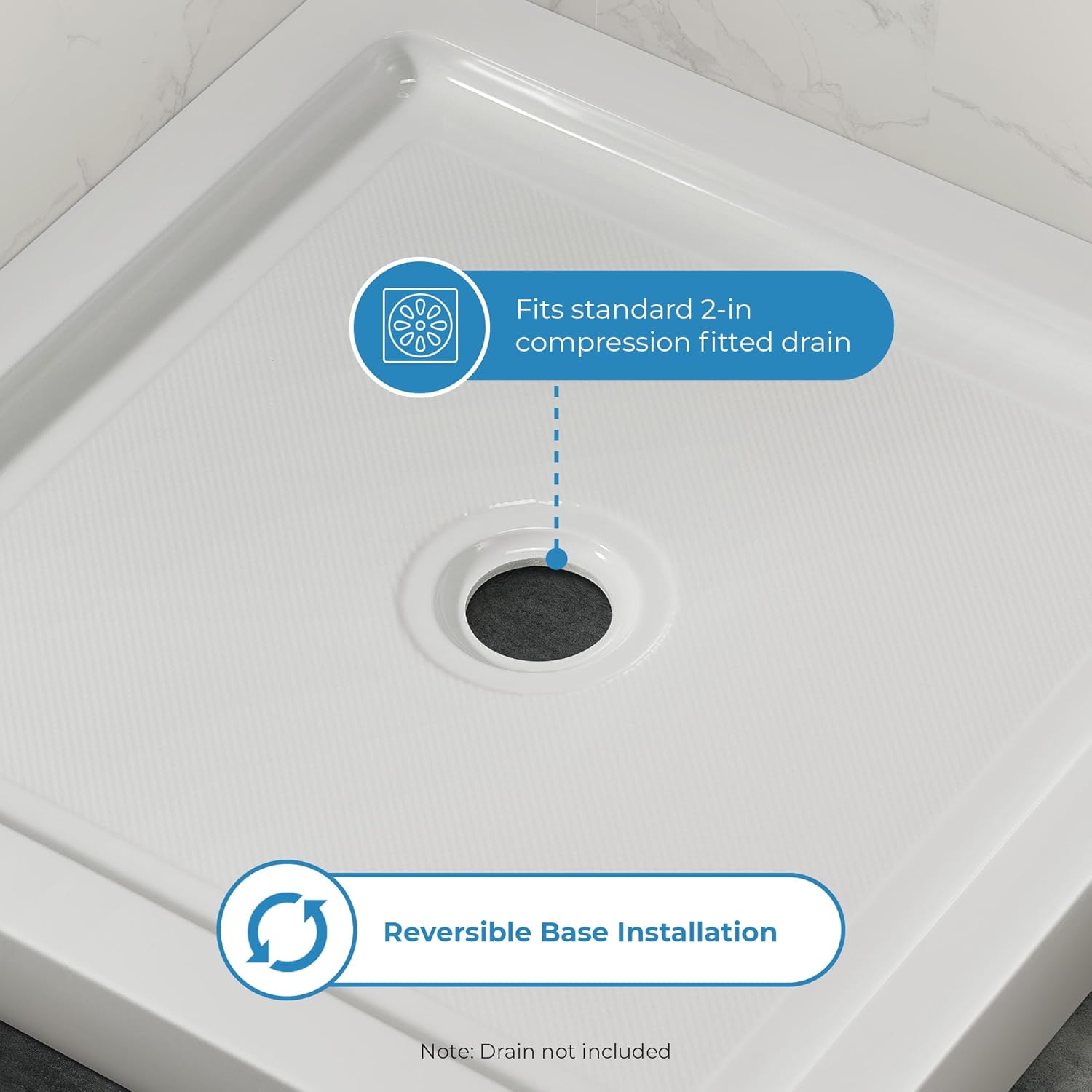 Avvicinamento view of the shower base drain, indicating it fits a standard 2-inch compression fitted drain.
