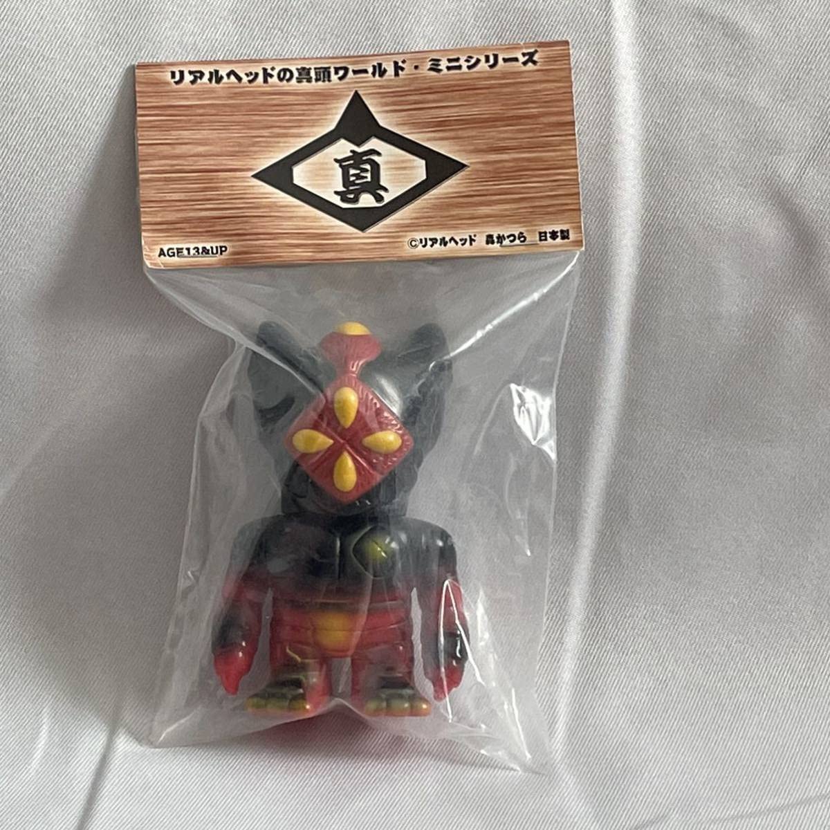 リアルヘッド ジンジャーR ミニ ソフビ フィギュア オレンジ 水色 笑い