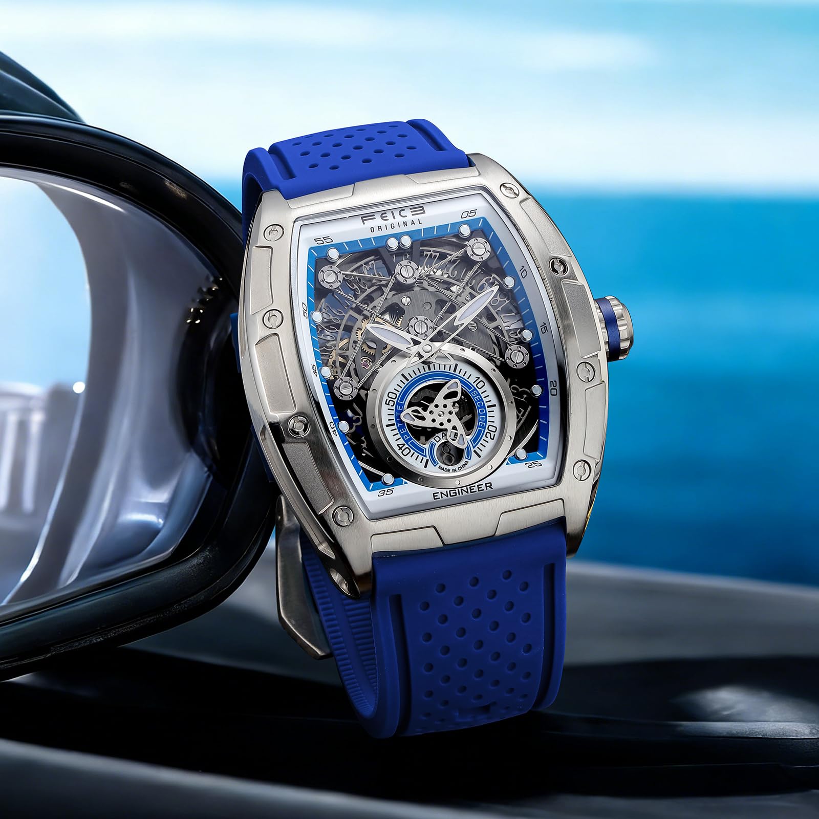 FEICE FM503 Orologio da Uomo Orologio Automatico Scheletrato Data Blu | Meccanico, Data, Forma a Barilotto, Vetro Minerale Blu Galvanizzato, Cinturino in Silicone Liquido, Cassa in Acciaio Inox