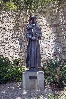 Photo : Statue of Anthony of Padua, Saint Anthony, holding the Child Jesus, located along the subterranean public walk known as River Walk bordering the San Antonio River in San Antonio 24in x 36in
