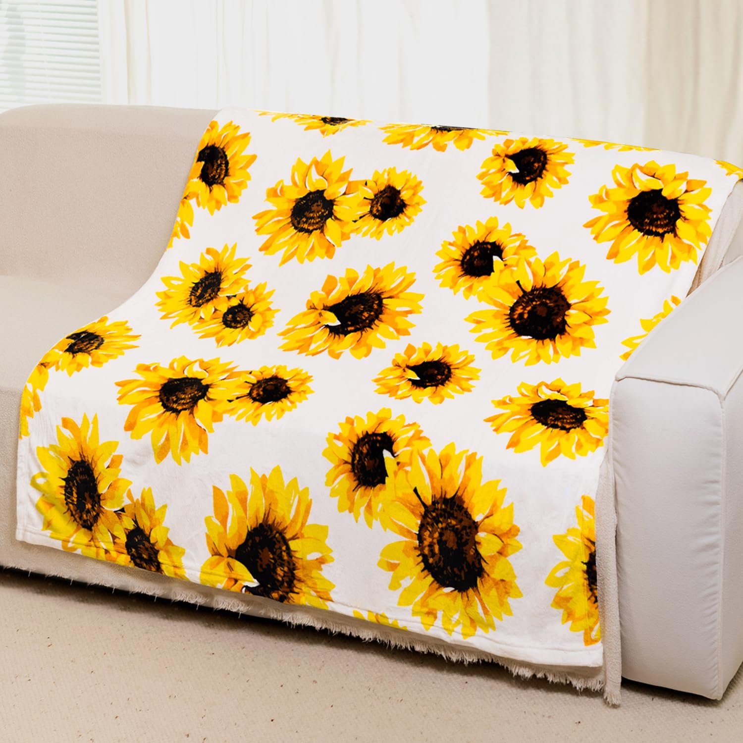 Couverture douce tournesol pour cocooning sur le canapé du salon