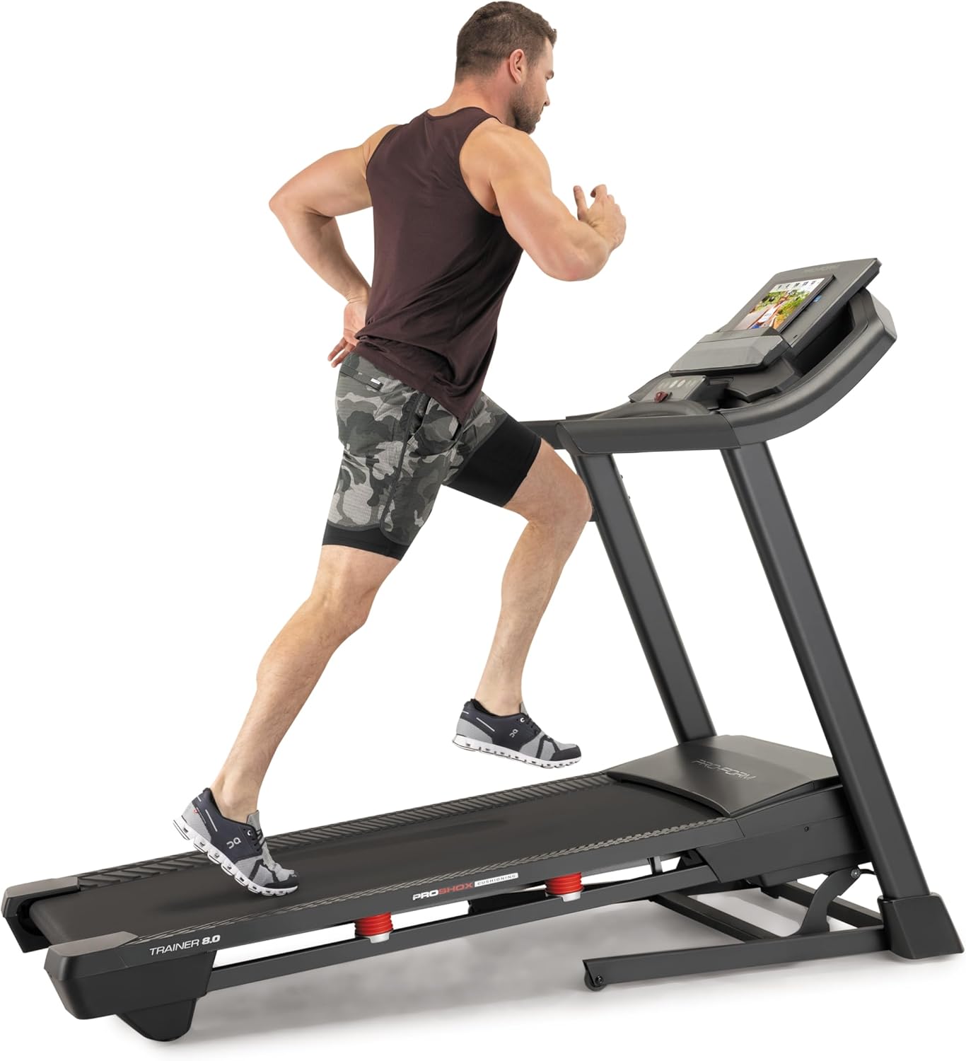 A man running on the ProForm Treadmill t8.5 from a different angle, showing the full running deck.