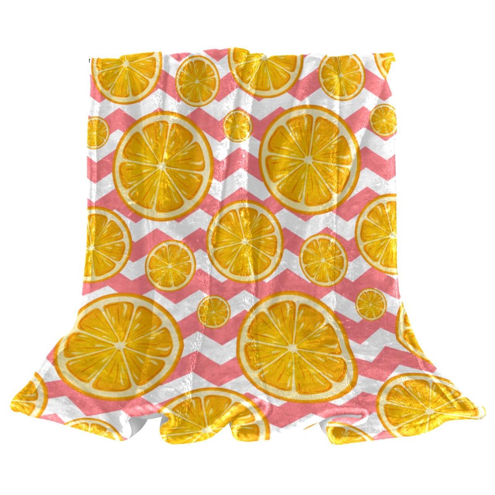 Couverture polaire légère au motif orange pour vos soirées canapé
