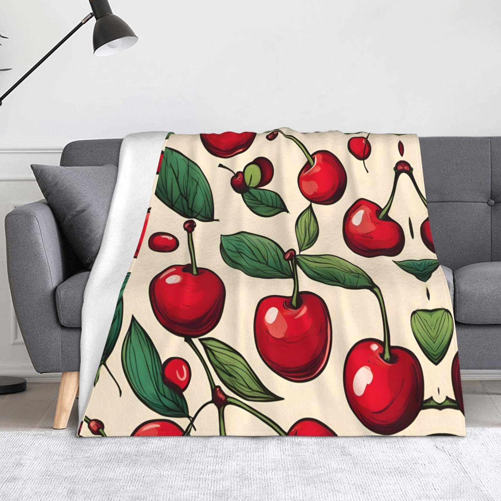 Couverture légère cerise 127x152 cm pour pallier le froid en camping et en voyage