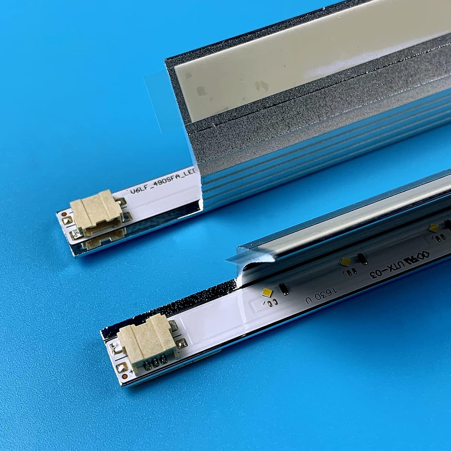 PANMILED LED backlight strips with protective film partially removed.