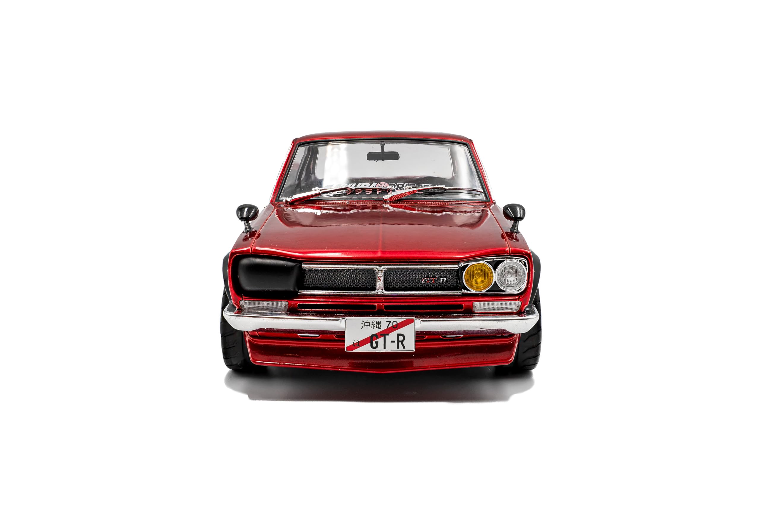 Solido Nissan Skyline (C10) Hakosuka – JDM-Klassiker, kantige Coupéform, Motorsport-Look, Kotflügelverbreiterungen, Diecast Modellauto, Rot, 1:18