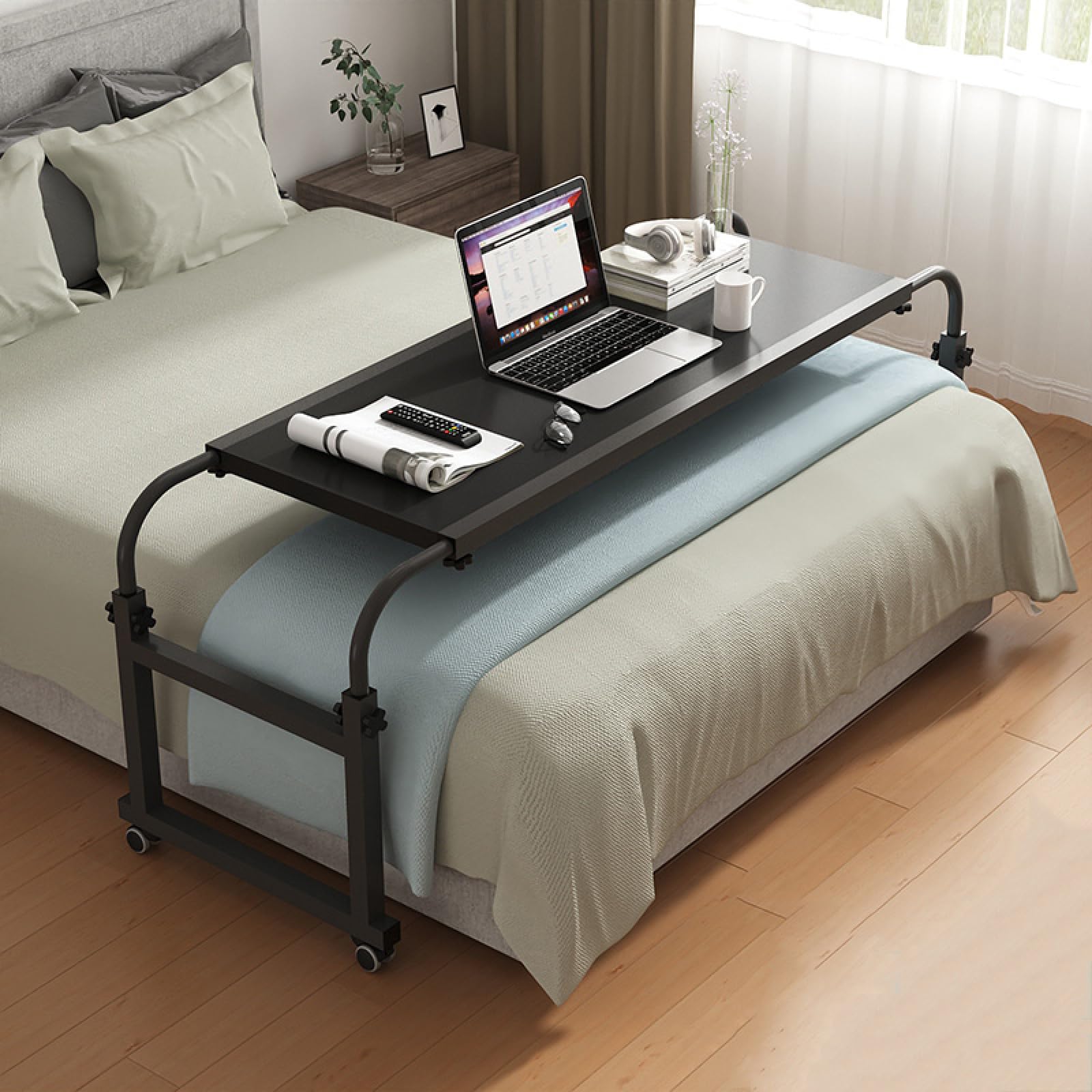 Table de lit avec roulettes noire pour travailler et lire sans fatigue