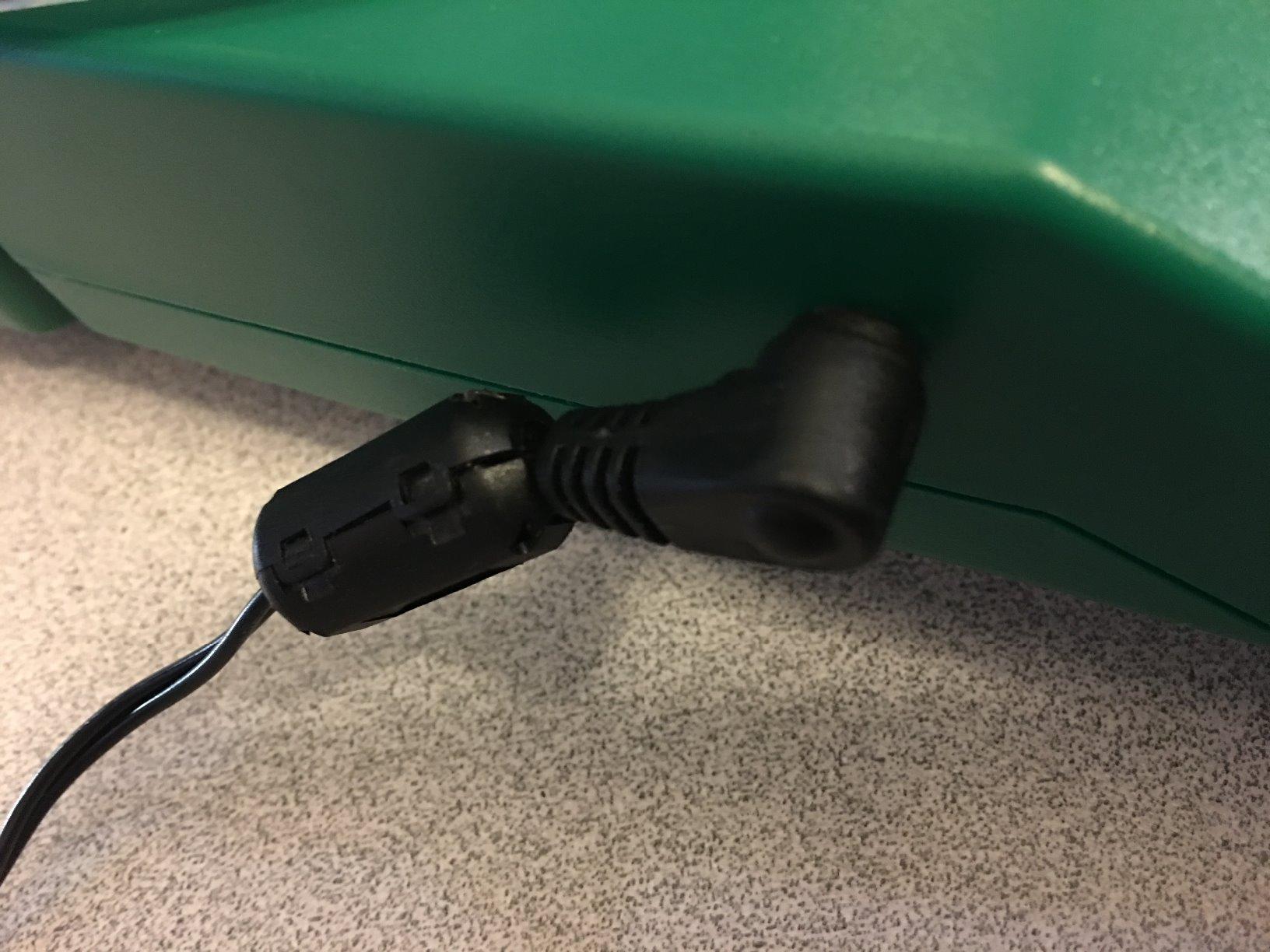 Fits on AC power cord.