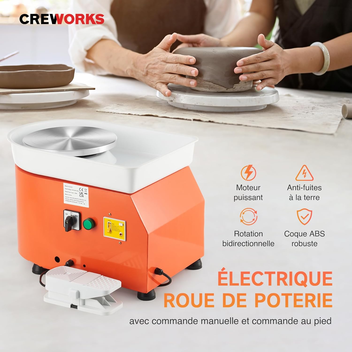 A person's hands working with clay on the CREWORKS Electric Pottery Wheel, highlighting the powerful motor and bidirectional rotation.