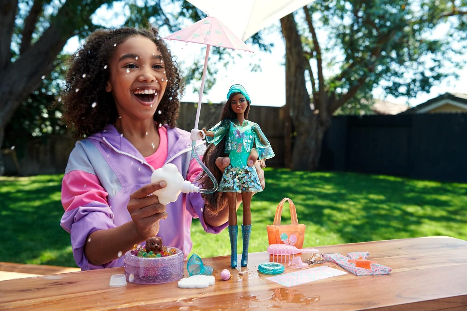 Barbie Color Reveal Sunshine and Sprinkles Doll & Accessories with 25 Surprises, Ice Cream Theme Including Water-Shower Umbrella & Color Change