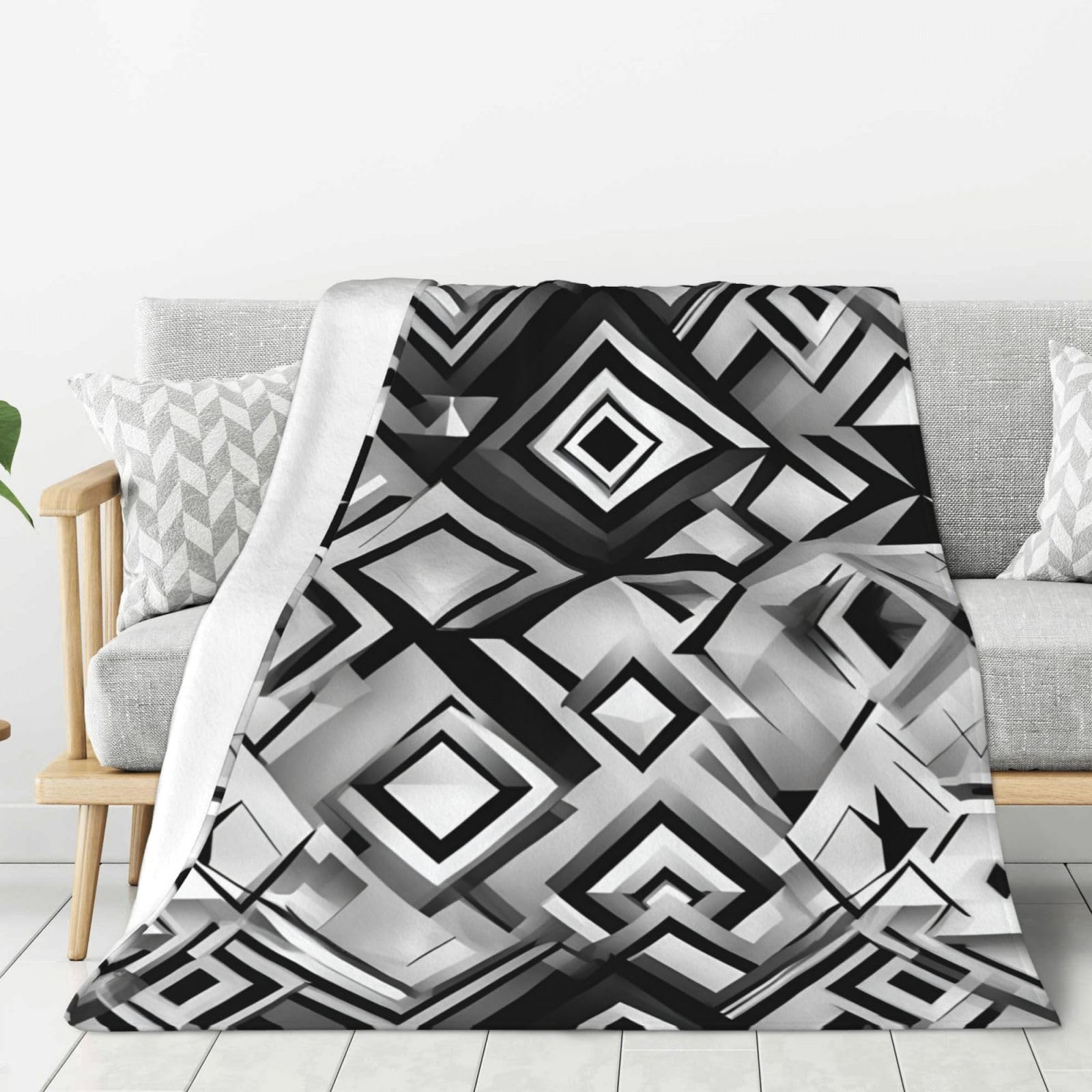 Couverture épaisse à motif géométrique pour vos soirées canapé et camping
