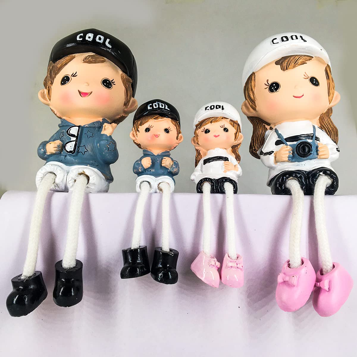 ELEGANT LIFESTYLE Cool Set Decorative Showpiece |Gift for him/her or Someone Special | Polyresin Cute Couple Holding Camera & Goggles, Hanging Legs Showpiece - 4 Pcs Set,Multicolor 5 71d4ROYeGCL. SL1200