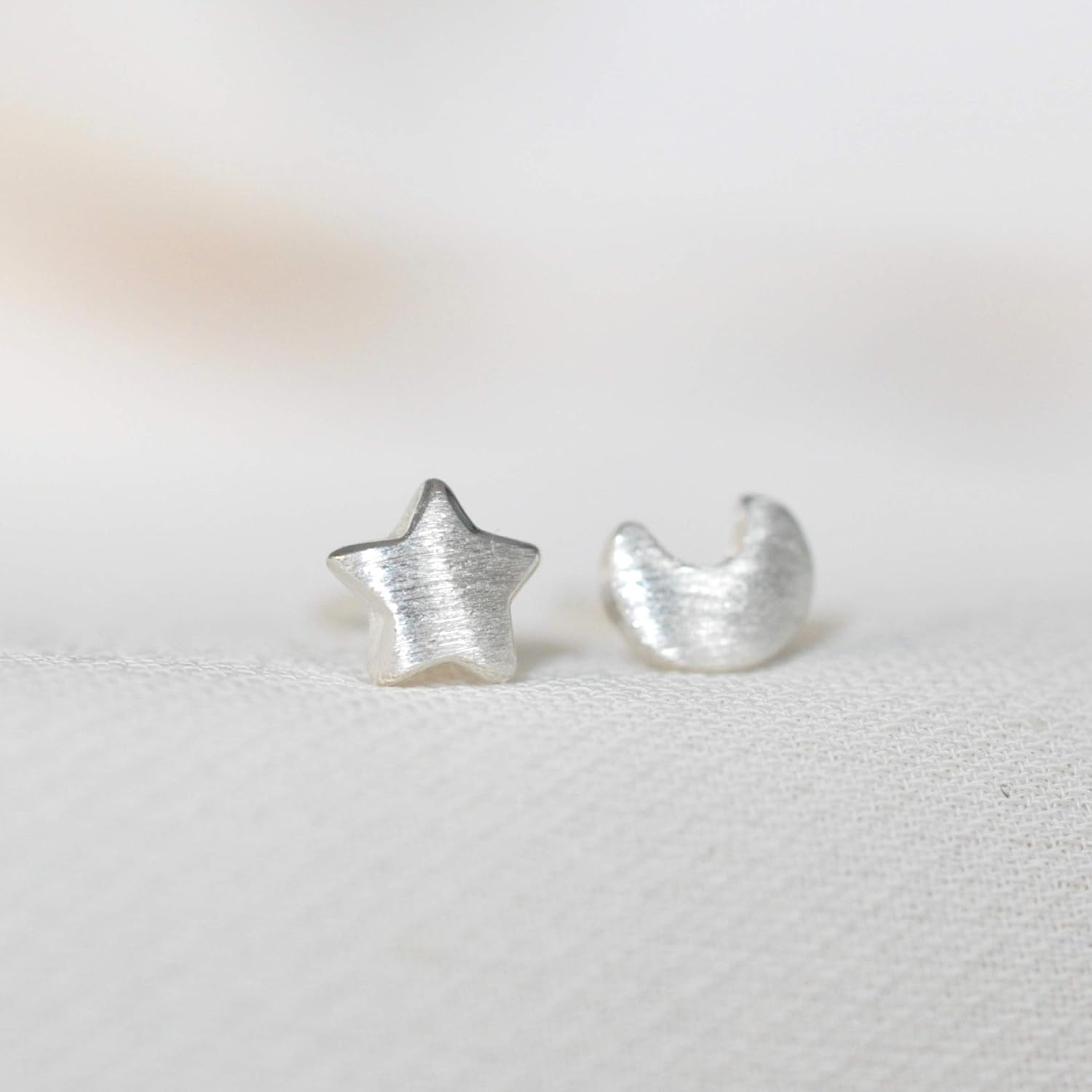 Mismatched Tiny Star and Moon Stud Earrings in Gold Finish