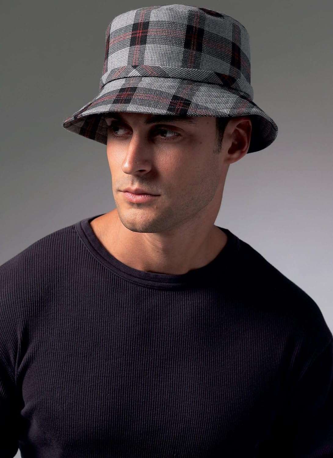 Model wearing Hat Style C, a plaid bucket hat, front view
