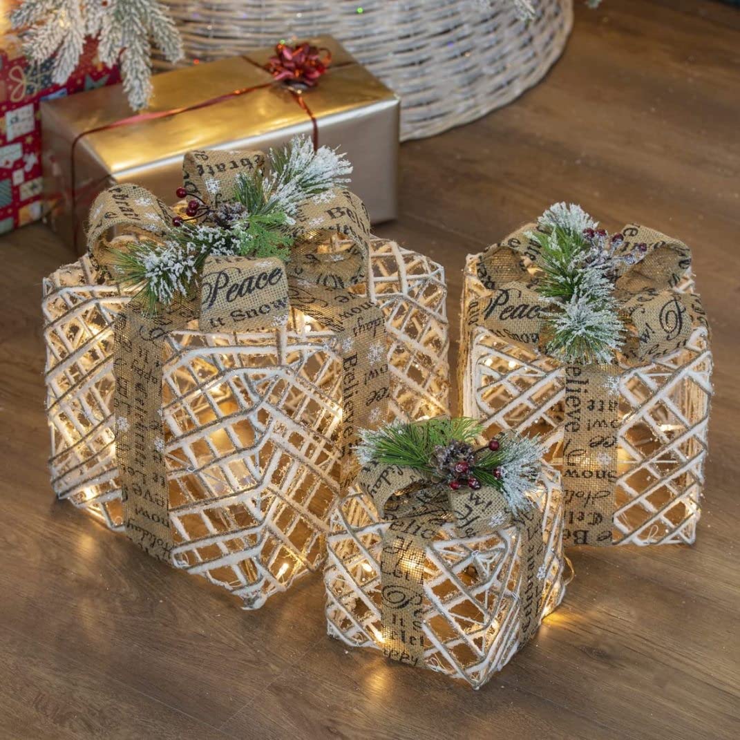 Décorations Noël d'intérieur lumineuses au pied du sapin : boîtes LED blanc chaud chaleureuses