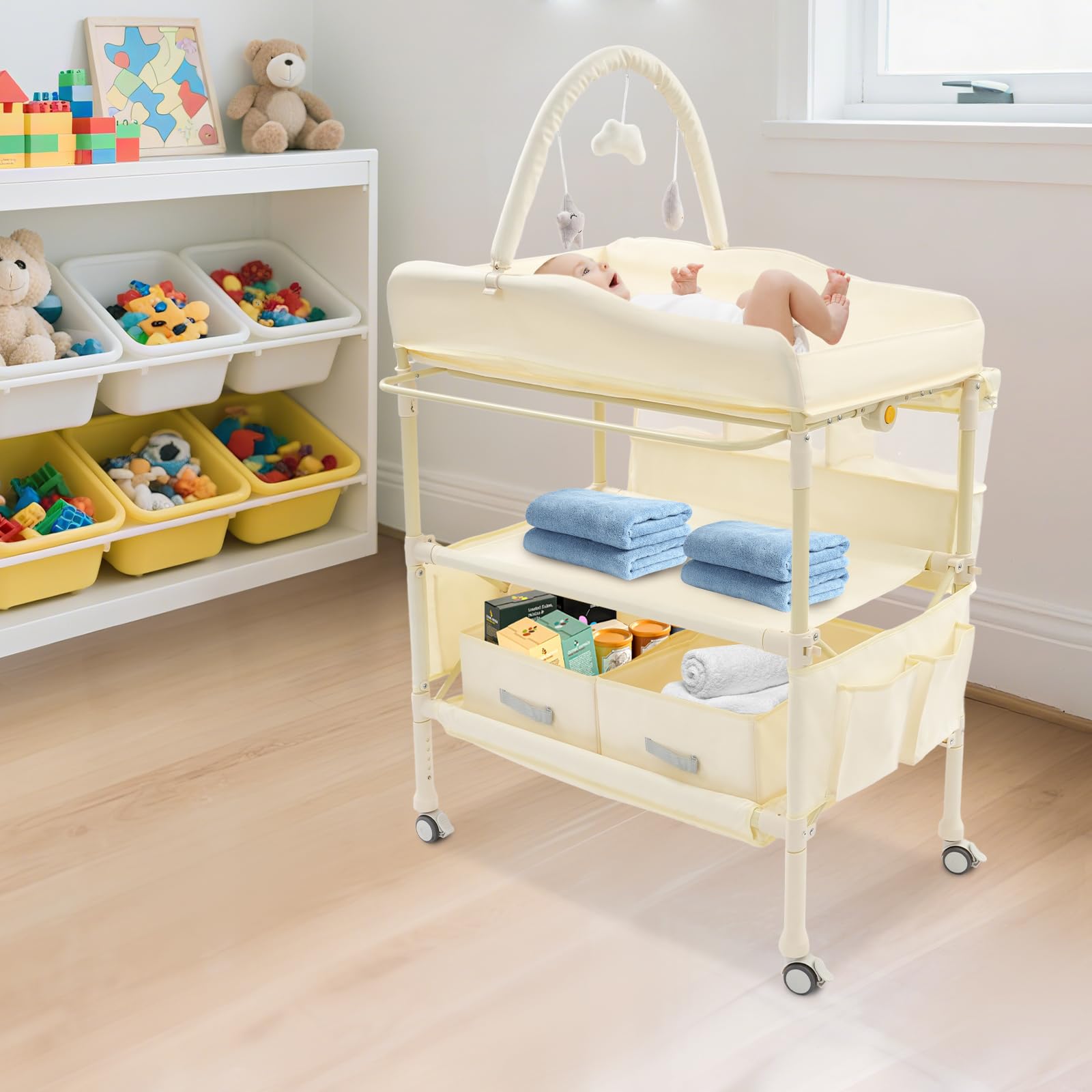 Cambiador de bebé beige con 2 cestas, altura ajustable 86-94 cm, capacidad de carga de 65 kg, 4 ruedas y cinturón de seguridad para dormitorio y habitación de bebé