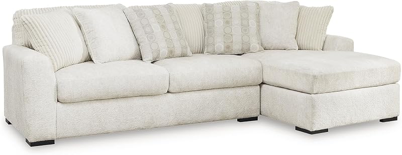 Signature Design by Ashley Chessington L-Shaped Sectional Sofa, Ivory | Sag-resistant platform foundation with reversible cushions, Textured polyester chenille for living room use