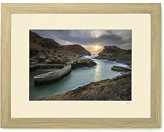 Mounted or framed photograph by Andrew Ray featuring the setting sun at Boscastle, Cornwall.