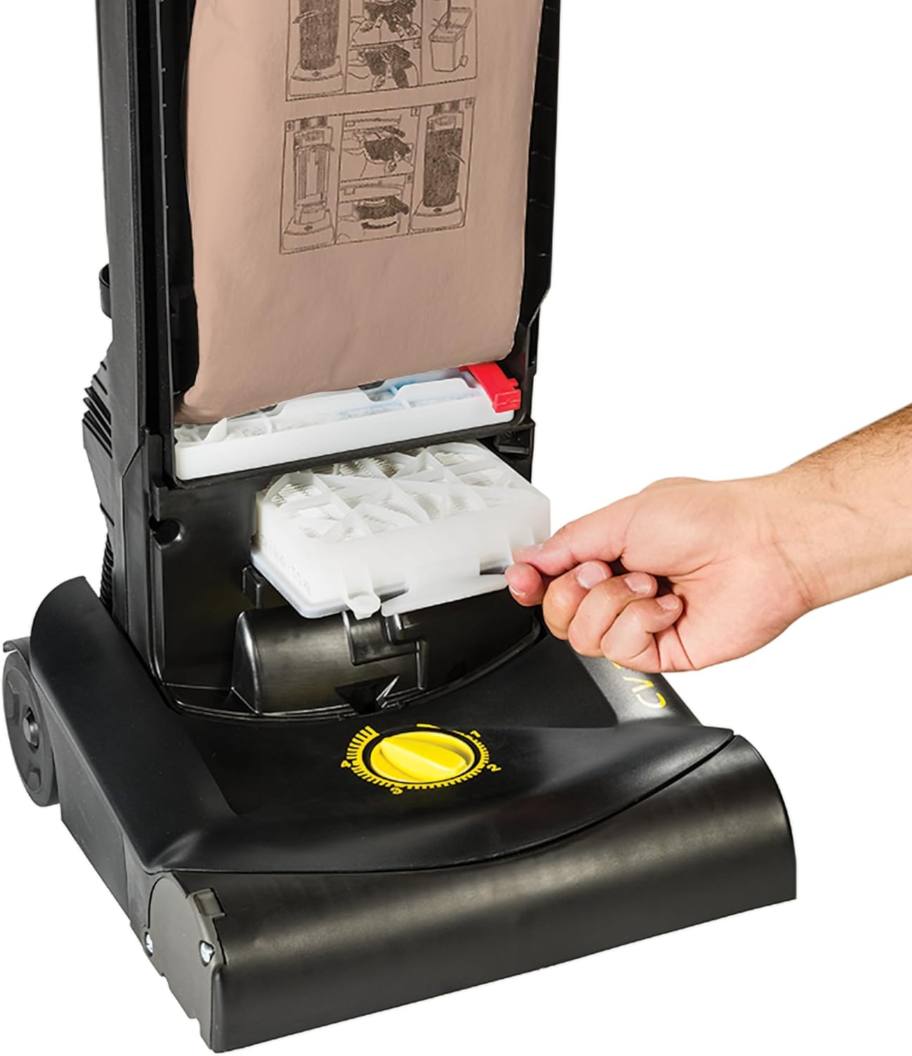 Hand removing the HEPA filter from the vacuum