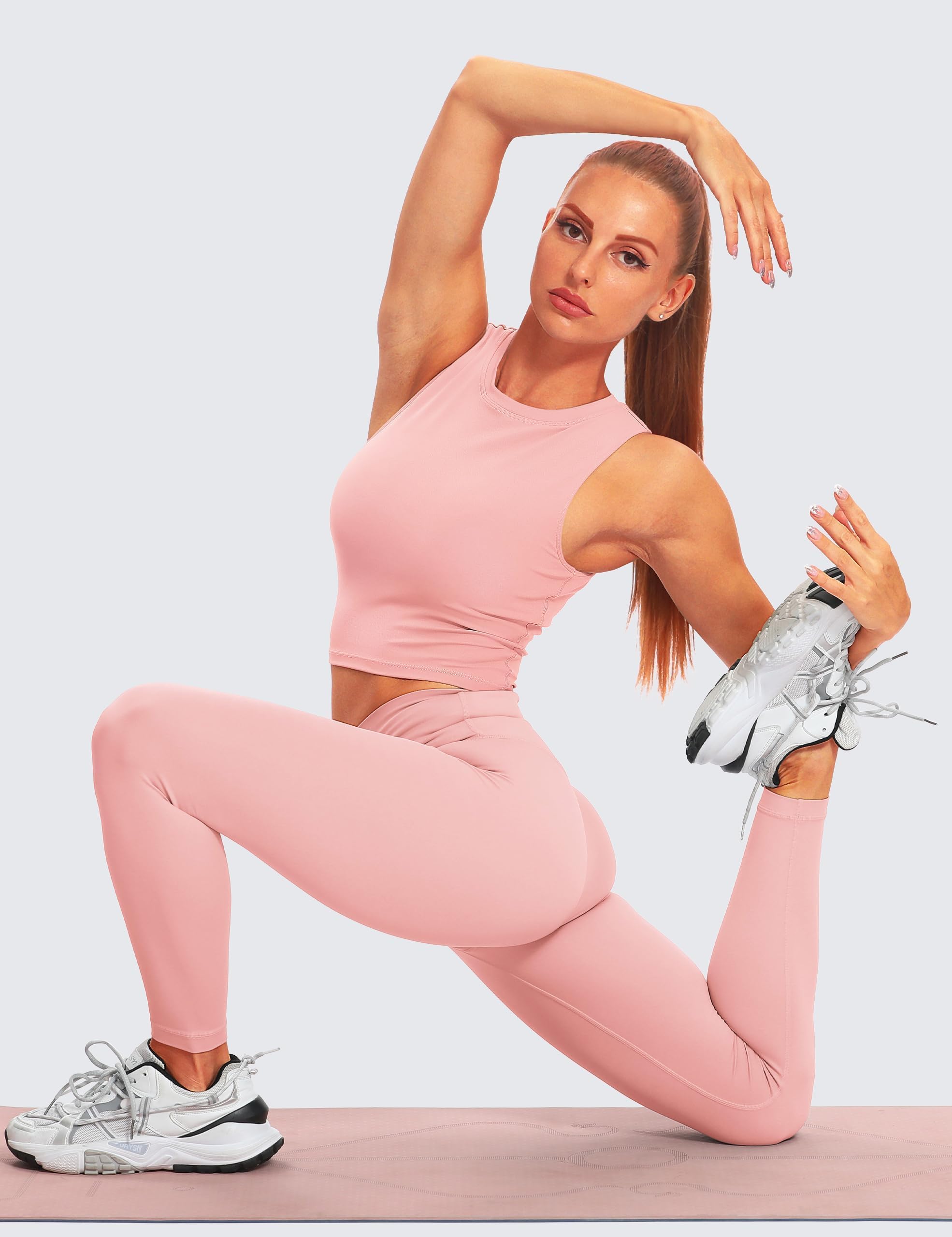 BAYDI Brasier deportivo con relleno extraíble, cuello alto, sin mangas, con brasier integrado, camiseta larga para yoga y entrenamiento